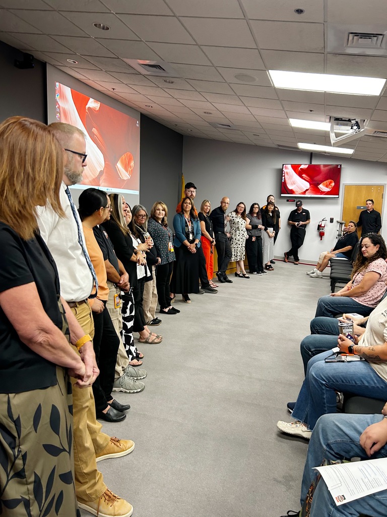 New employees gather in a meeting room during Aztec Municipal Schools' New Employee Orientation as district leaders welcome them to the 2026–2027 school year.
