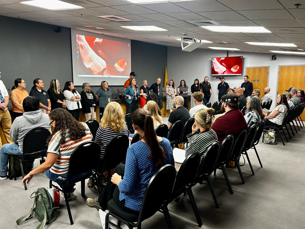 New employees gather in a meeting room during Aztec Municipal Schools' New Employee Orientation as district leaders welcome them to the 2026–2027 school year.