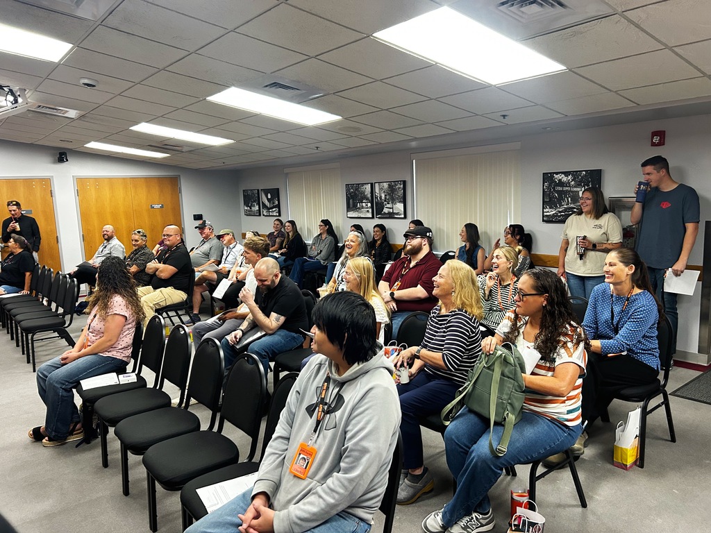 New employees gather in a meeting room during Aztec Municipal Schools' New Employee Orientation as district leaders welcome them to the 2026–2027 school year.