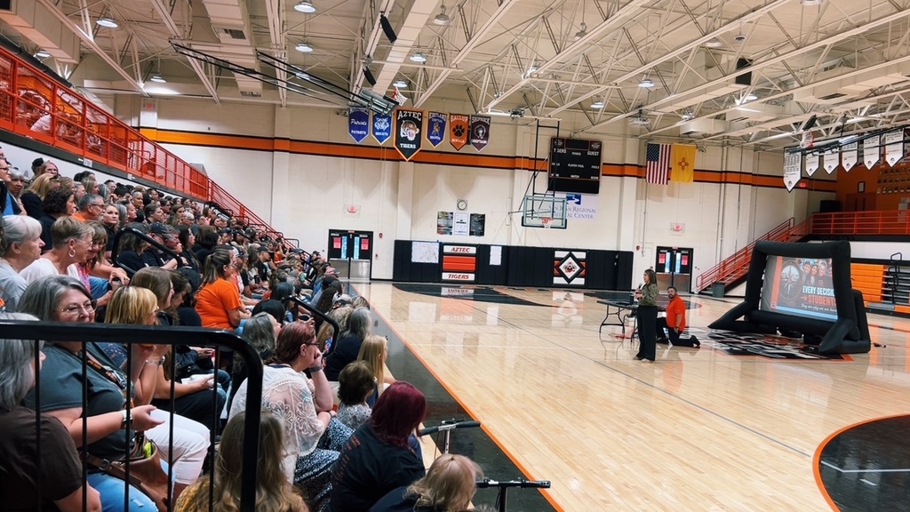 Aztec Municipal Schools staff members gather together during the district’s Welcome Back event, celebrating the start of the 2026–2027 school year and recognizing employees for their years of service.