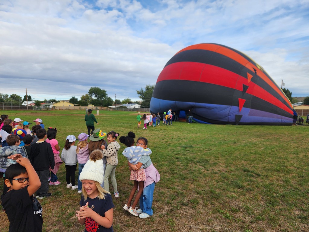 Lydia Rippey students learn about hot air balloons and get the chance to explore a real, colorful hot air balloon with the help of Jaidan Martinez and Tylee Torrez from Pagosa Adventures.