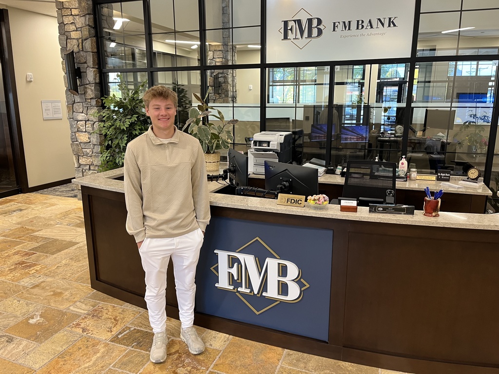 A student interns at a bank