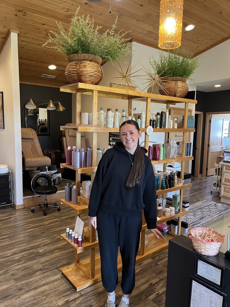 A student interns at a salon