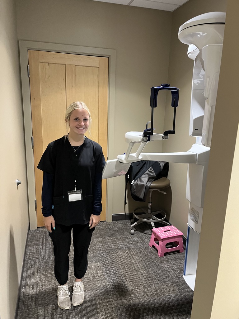 A student interns at an eye clinic