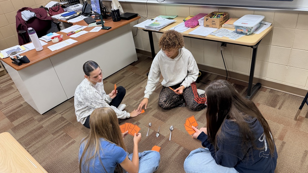 Students play a game in English class