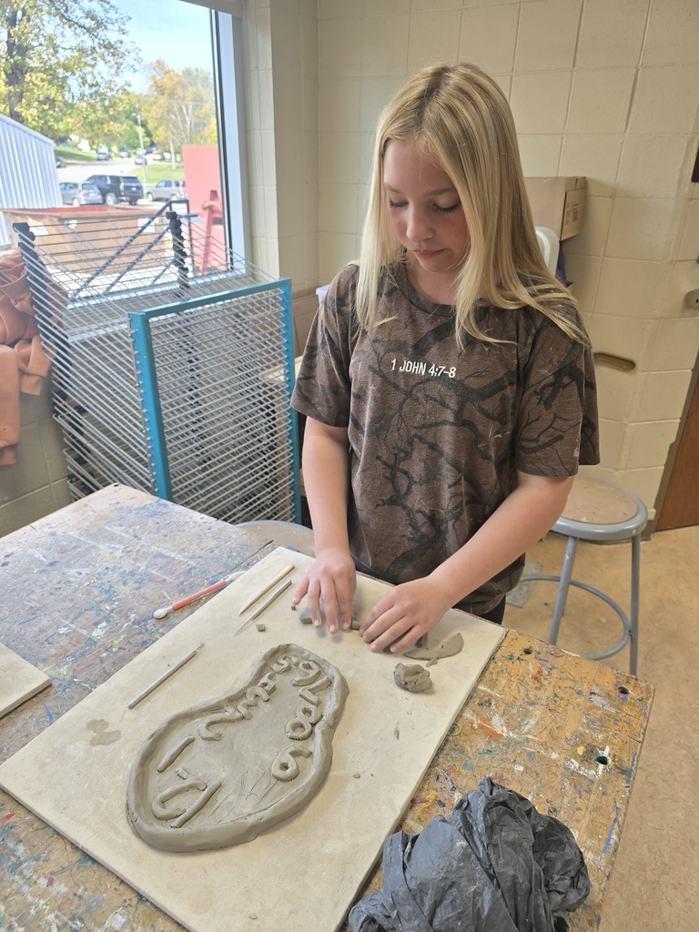 8th grade art students used clay to create their own clocks that appear to be melting