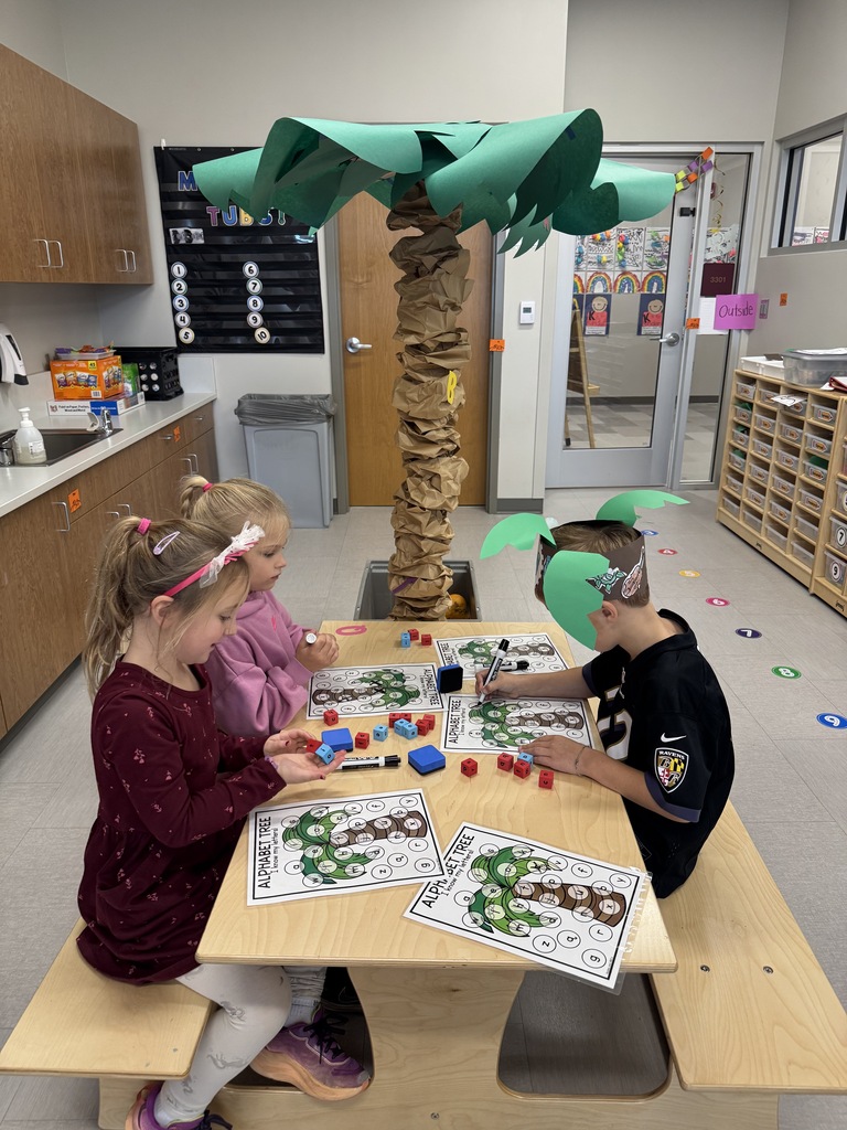 Kindergarteners celebrating letters with Chicka Chicka Boom Boom Day