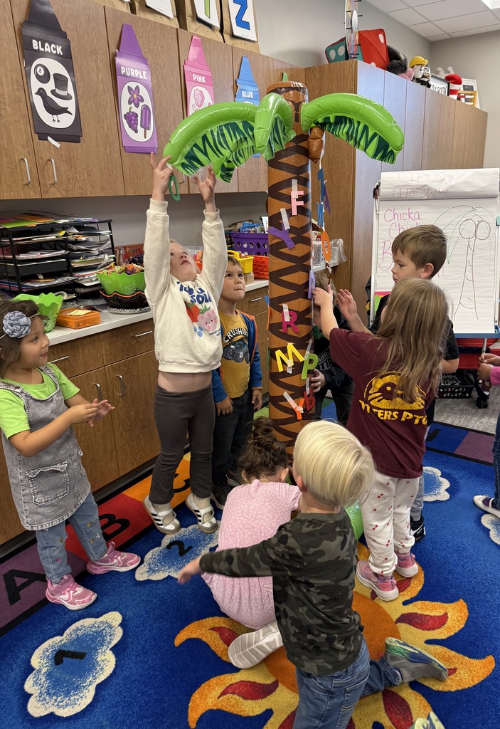 Kindergarteners celebrating letters with Chicka Chicka Boom Boom Day