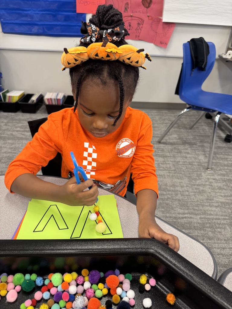 Kindergarteners celebrating letters with Chicka Chicka Boom Boom Day