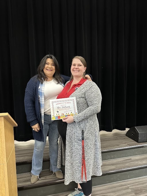 Mrs. Szabo and Mrs. Hofland. Mrs. Hofland is our staff member of the month