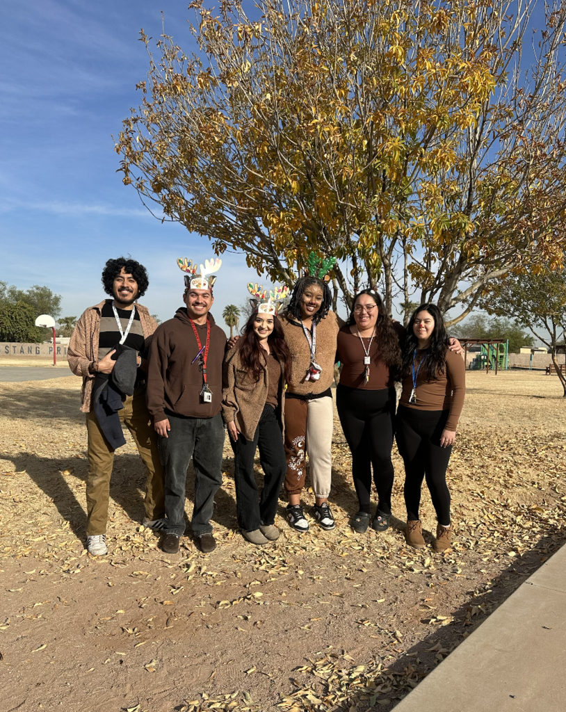 staff wearing reindeer outfits