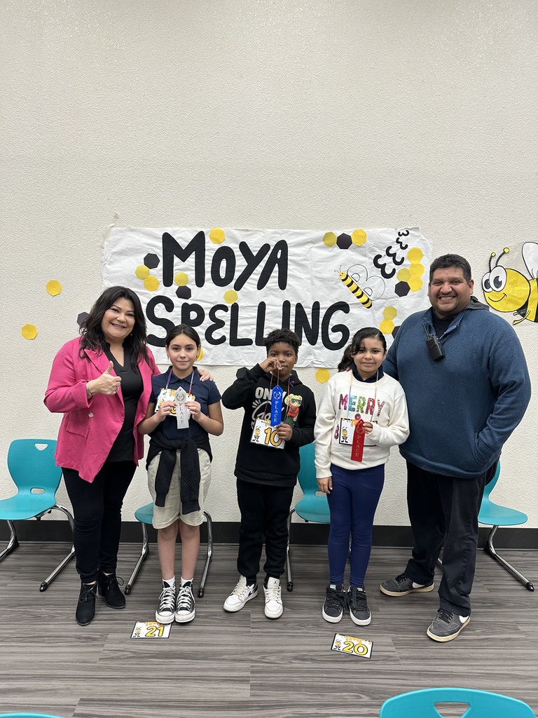 students with staff for spelling bee