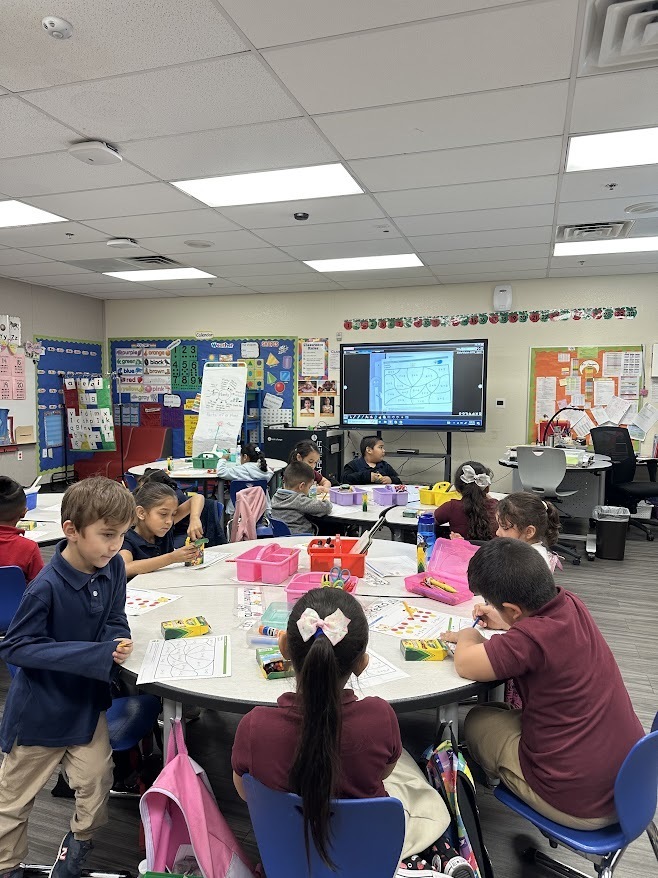 students working on work in the classroom