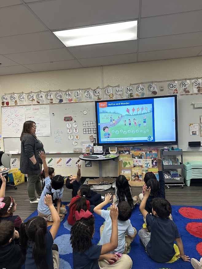 teacher teaching in the classroom to students