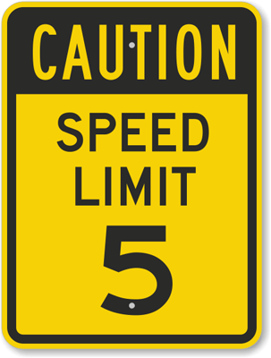 Yellow caution traffic sign with text that reads "Caution speed limit 5"