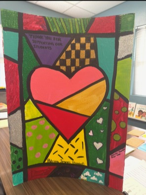 Dedicated to Patricia Jimenez (President). Features green polka dots and a yellow sunburst pattern.