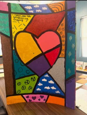 Dedicated to Harry Garewal Jr. (Vice-President). Features peace signs and a red glitter section.