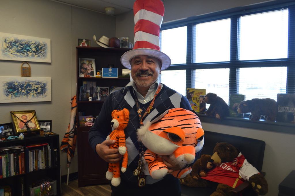 Principal with cat and the hat on 