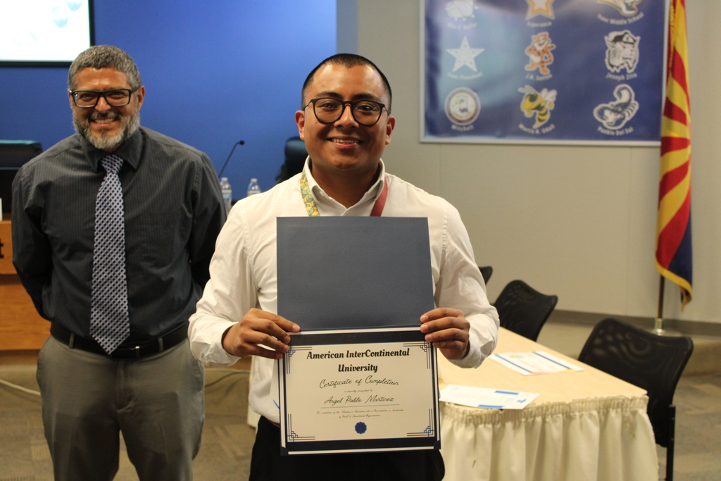 Angel  Martinez with certificate