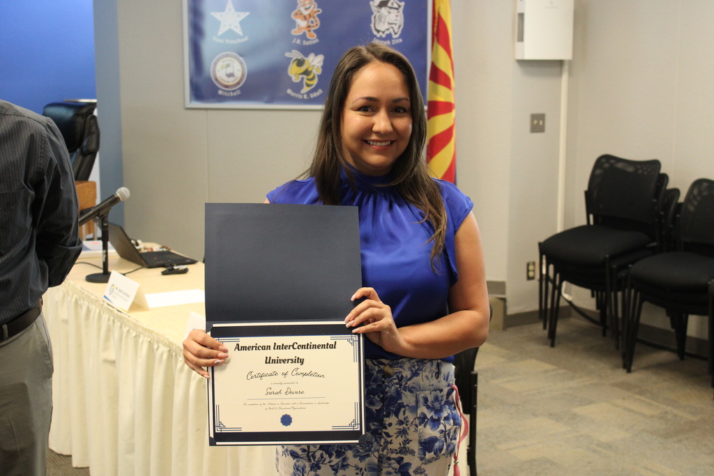 Sarah Devore with certificate