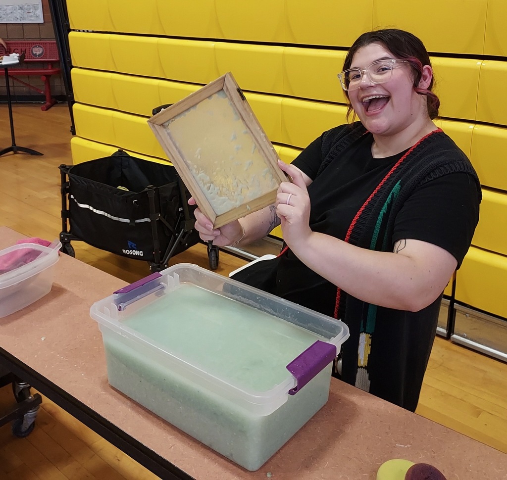 Mrs. Szabo at the paper making station