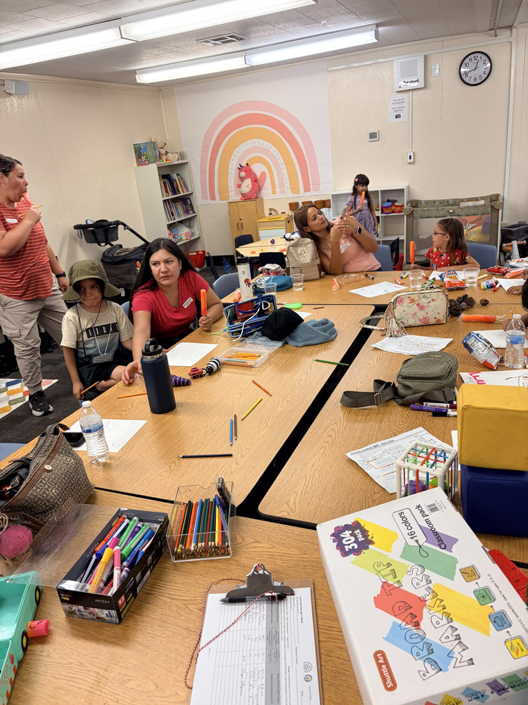 Families inside a classroom at Alta E Butler