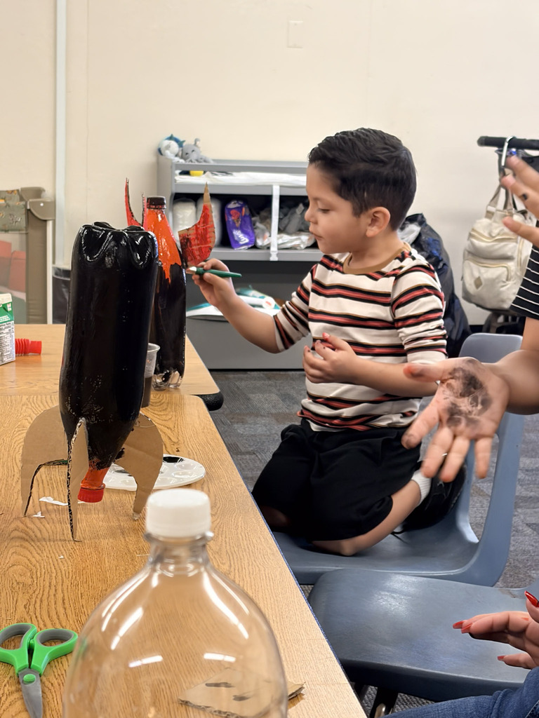 student creating rocket