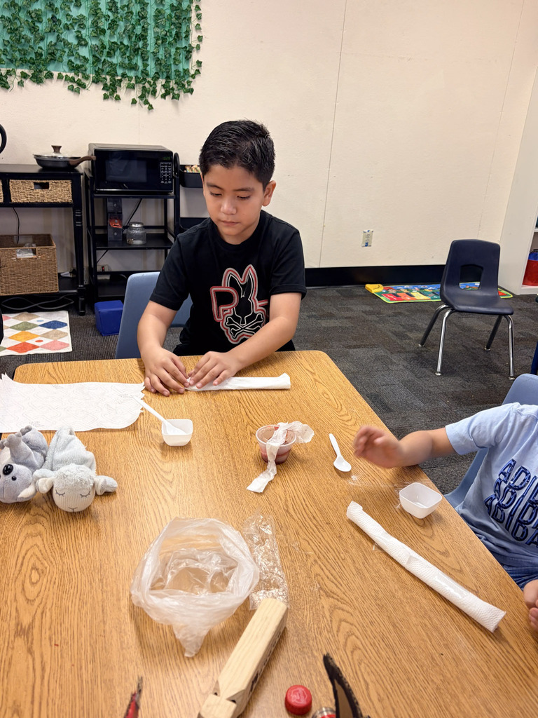 student creating rocket