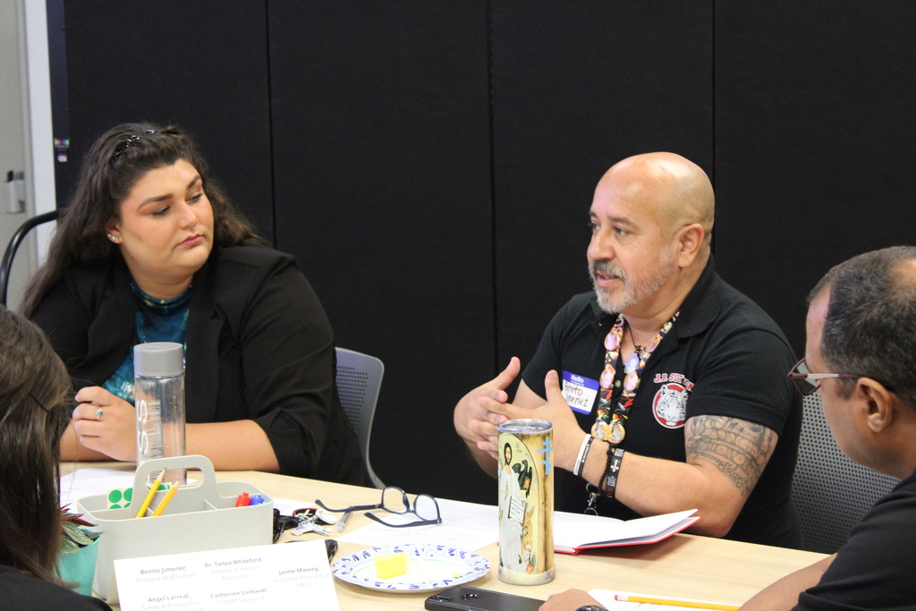 Principal Benito Jimenez Explaining themselves to staff