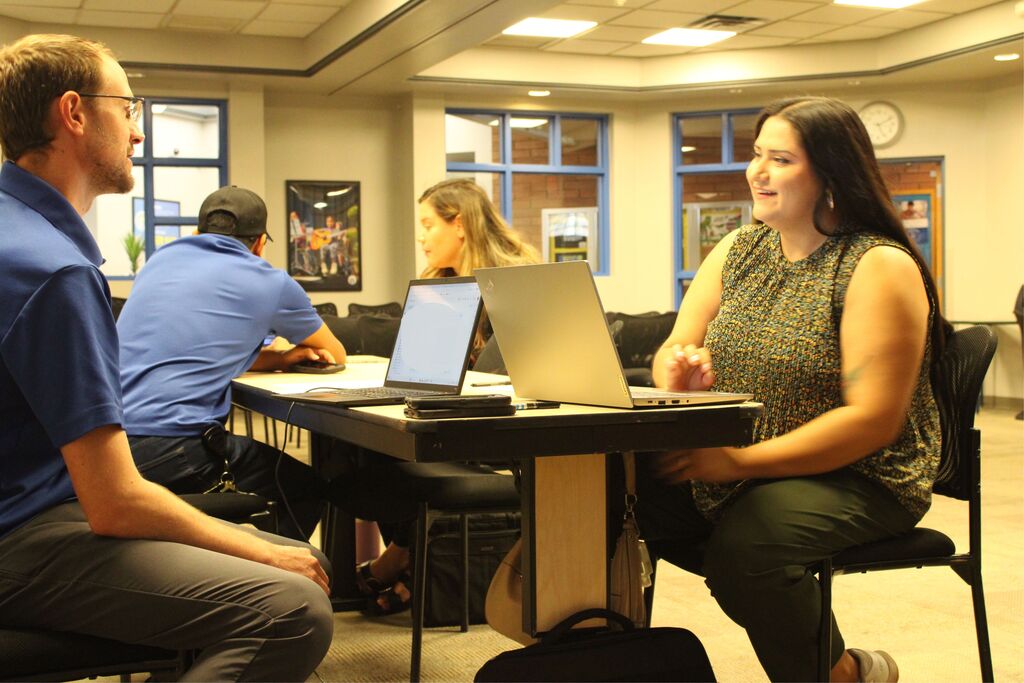 Tech team helping onboard new employees