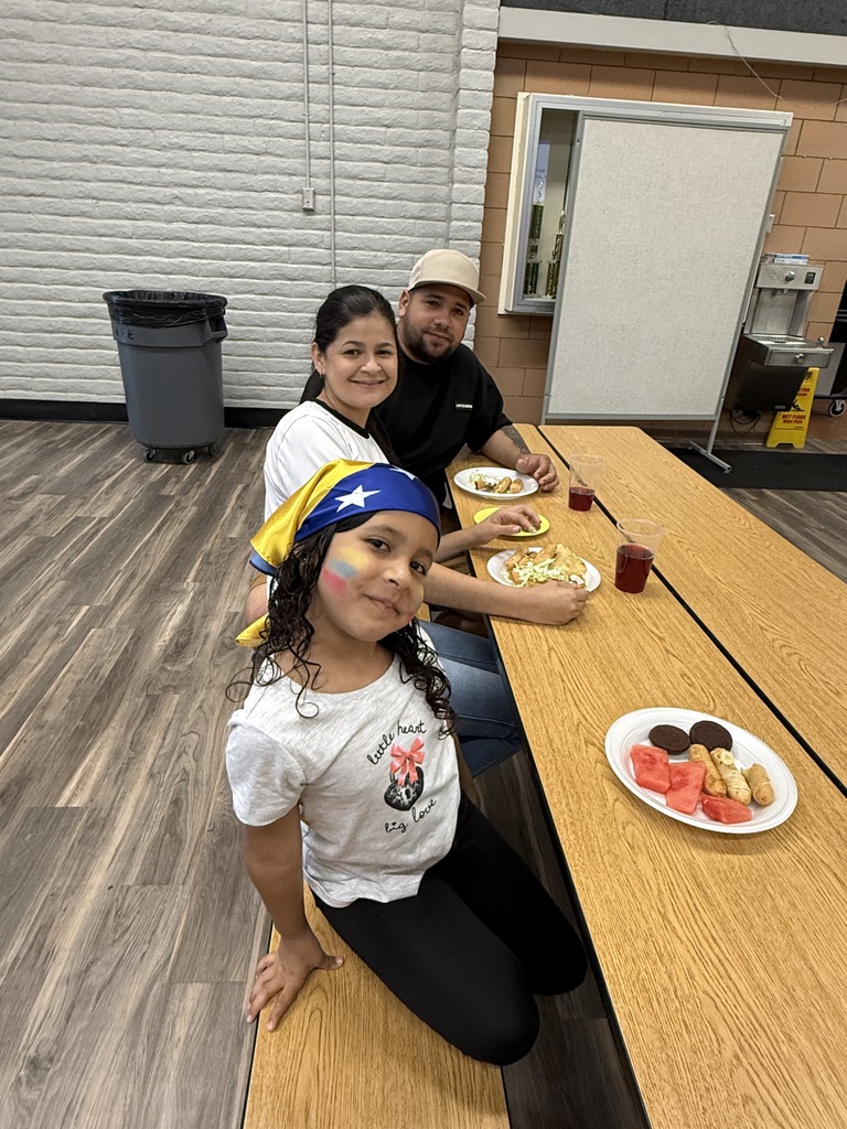 Our Title I and Heritage Night was a wonderful evening celebrating the diverse cultures and traditions of our school community. Families were invited to bring a favorite food that represented their culture and heritage, allowing everyone to share and experience a variety of delicious dishes. The evening also provided an opportunity for parents to learn more about Title I and how it supports our students and families. Our principal, Ms. Couret, spoke with parents about the Title I program, school resources, and the importance of family involvement in student success. The event brought families, staff, and the school community together to celebrate our diversity and strengthen our partnerships.