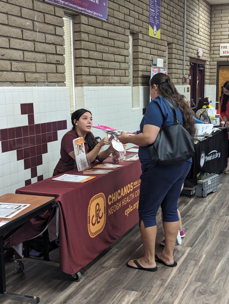 parent speaking to organization full of resources