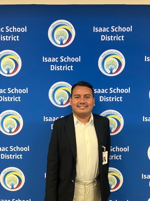 new isd member in front of blue iSD backdrop