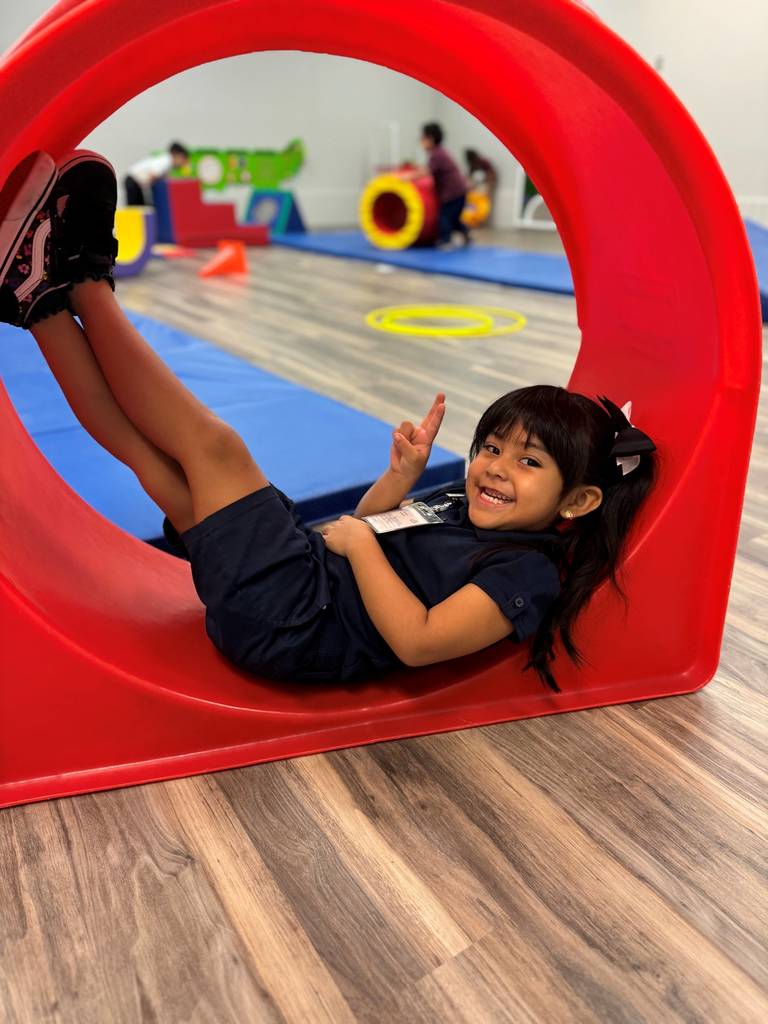 girl lounging in tunnel
