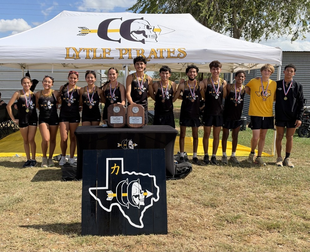 Varsity Cross Country teams with their district championship trophies