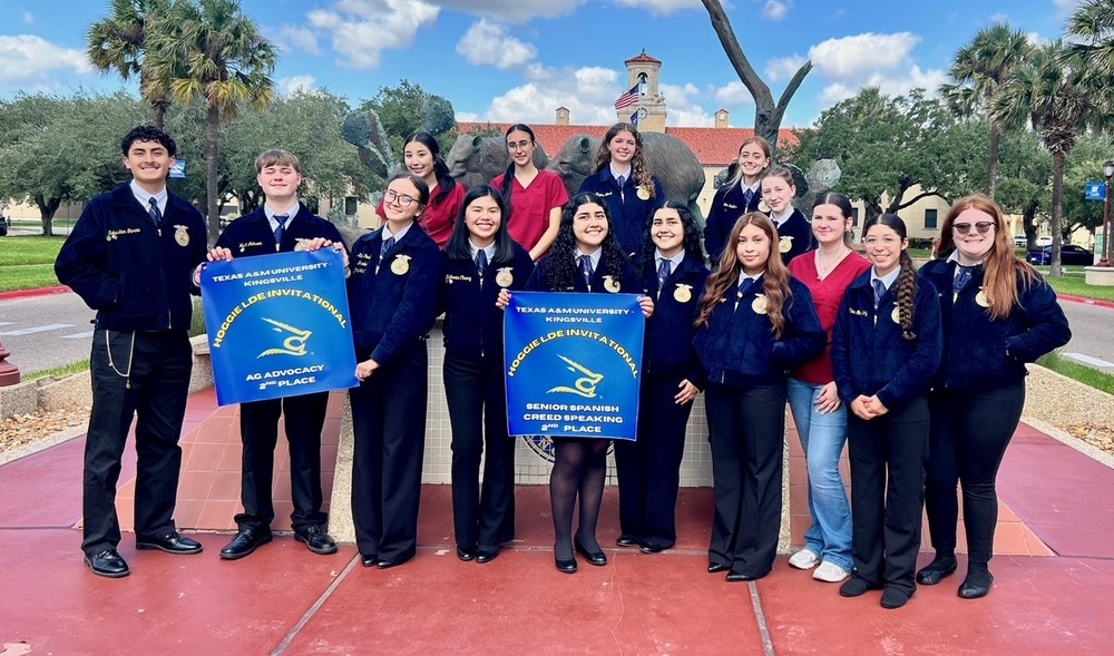 Lytle FFA team showing banners they earned