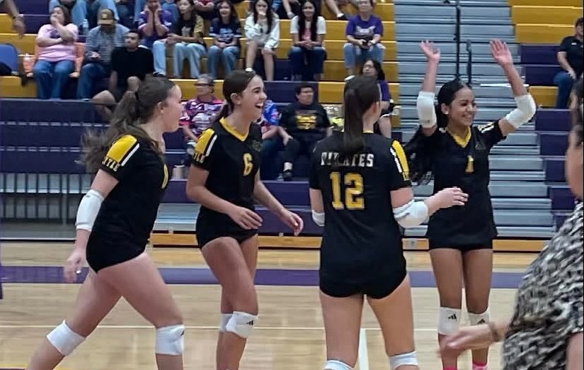 Volleyball team celebrates after defeating Carrizo Springs 