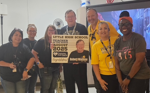 Mr. Mumme receives award from High School Admin