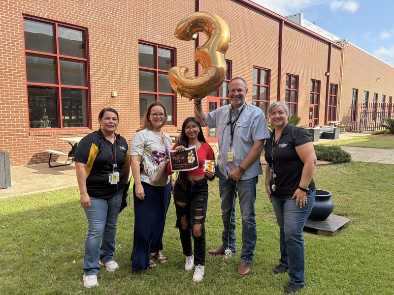 No 3-ranked senior Annika Robles with school administrators