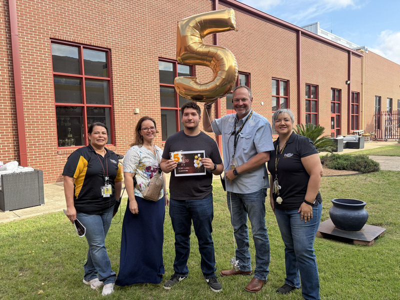 No 5-ranked senior Koby Lara with school administrators