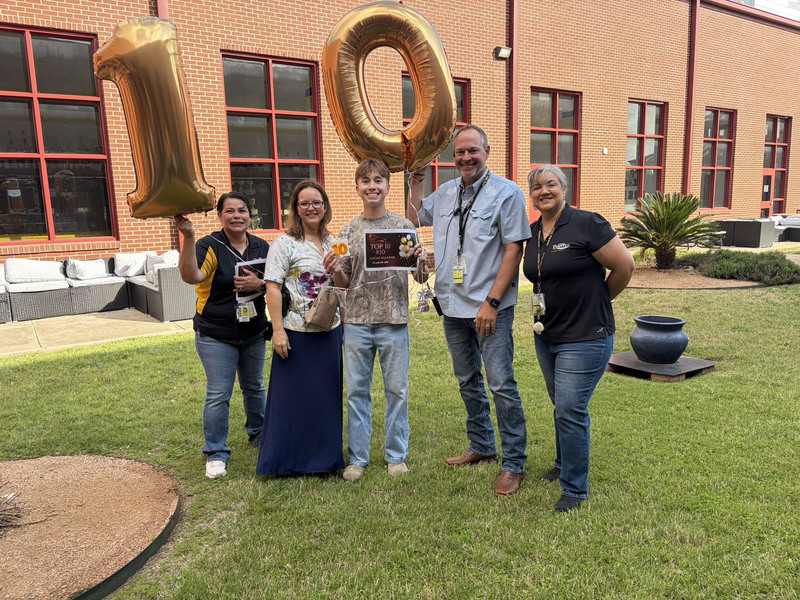 No 10-ranked senior Lucas Salazar with school administrators