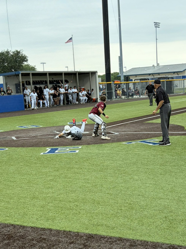 Weston Jackson sliding into home
