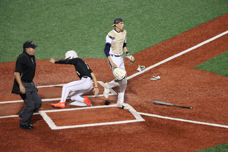 Weston Jackson sliding into home