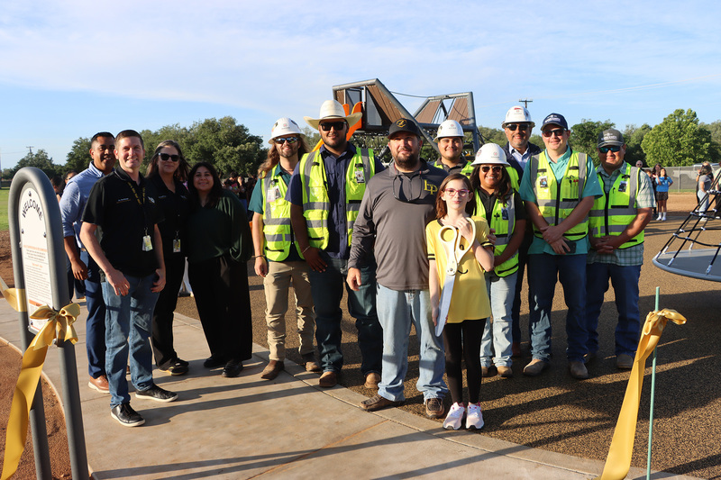Lizzy Duty with district and school leaders, contractors and architects