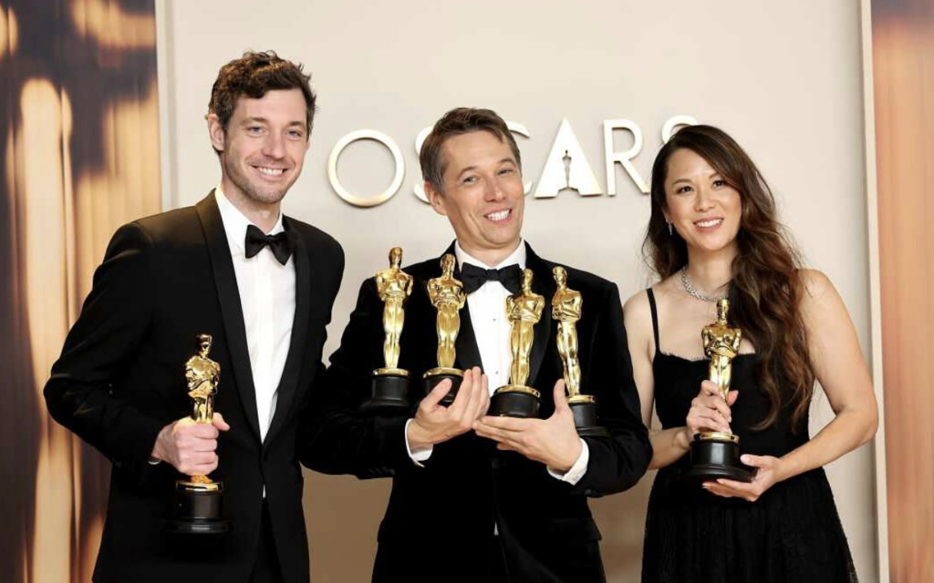 (Left to right): Alex Coco, Sean Baker, and Samantha Quan holding Oscars awards