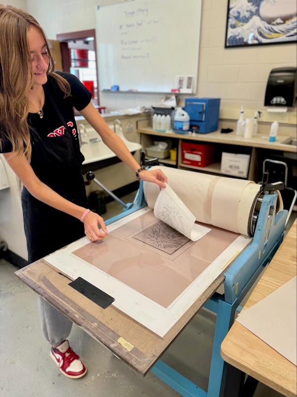 student checking placement while curiopsity