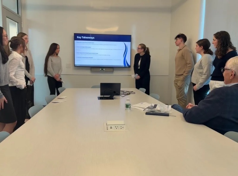 Club members doing a presentation