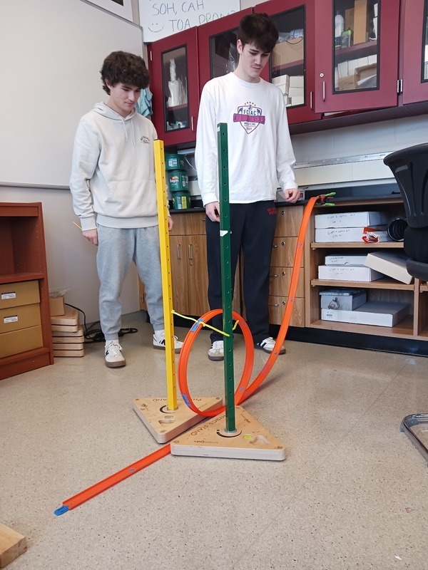 Physics students working on lab