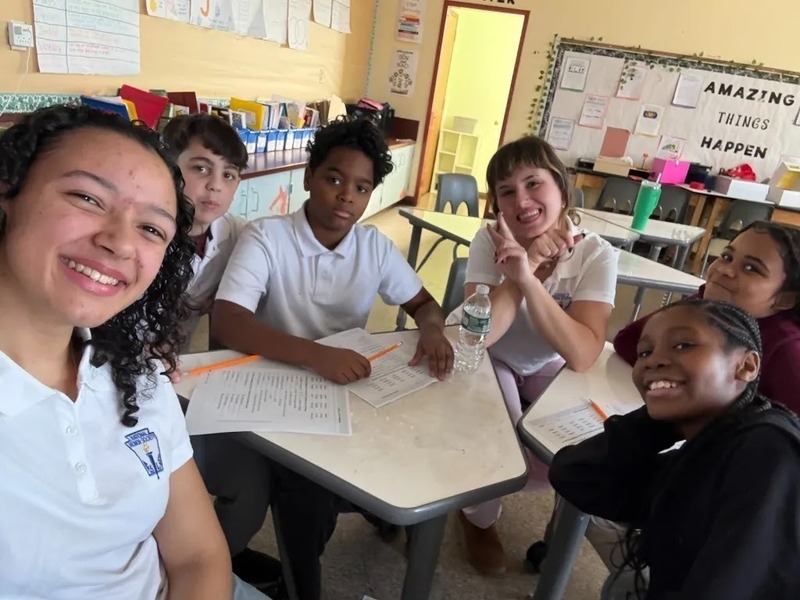 NHS student with the kids