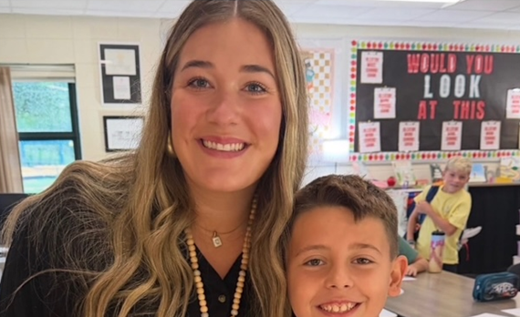 Mrs. Crenshaw with one of her Students